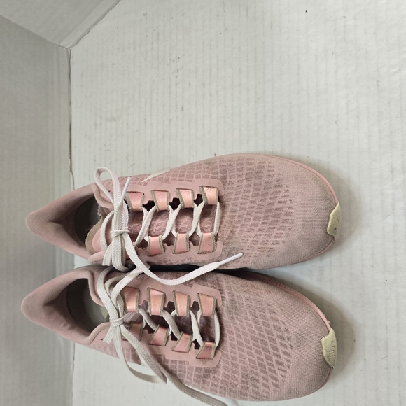 Nike Shoes - Nike Pink and White‎ Athletic Shoes with Textured Knit Design